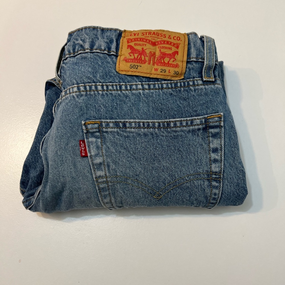 Authentic Levi Strauss blue jeans . Style 502 in W 29 L 30.